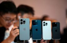 Apple and Nvidia logos over stock market chart reflecting tariff relief hopes