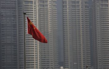 Chinese and U.S. flags symbolizing trade tensions