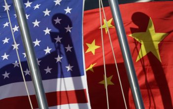 Chinese and U.S. flags symbolizing diplomatic tensions