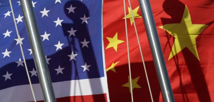 Chinese and U.S. flags symbolizing diplomatic tensions