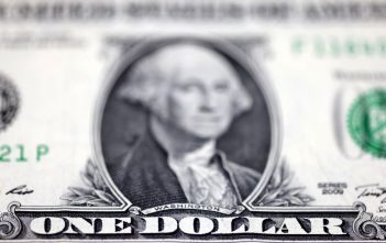 U.S. dollar bills representing currency stability