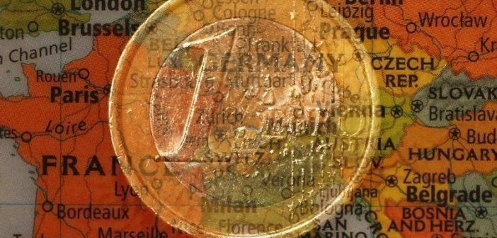 Euro symbol with global financial backdrop