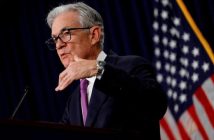 Federal Reserve building with economic indicators overlay