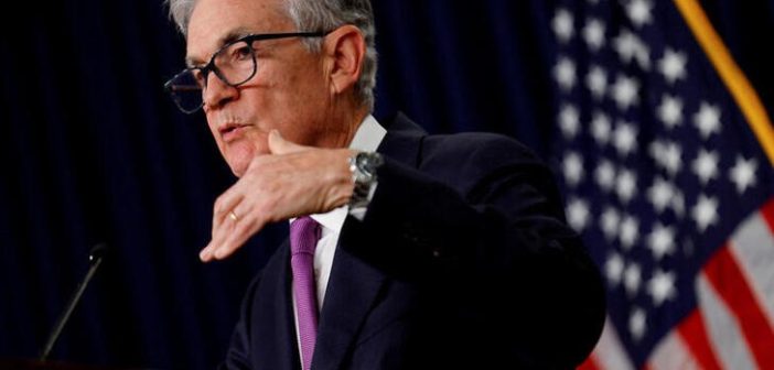 Federal Reserve building with economic indicators overlay