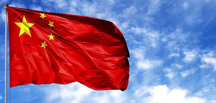 Chinese flag over Bitcoin and Ethereum symbols with warning icon