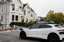 Zoox autonomous robotaxi vehicle on a city street