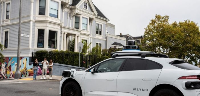 Zoox autonomous robotaxi vehicle on a city street