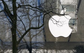 Apple headquarters with EU flag overlay, symbolizing legal appeal