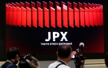 Asian stock charts with Middle East map and Japan CPI data overlay