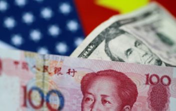 Currency symbols representing Asian currencies with a declining U.S. dollar symbol