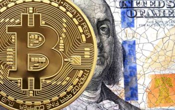 Bitcoin with U.S. debt chart in background