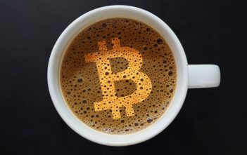 Vanadi Coffee logo with Bitcoin background