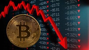 Bitcoin crash chart with falling price trend and gold rising