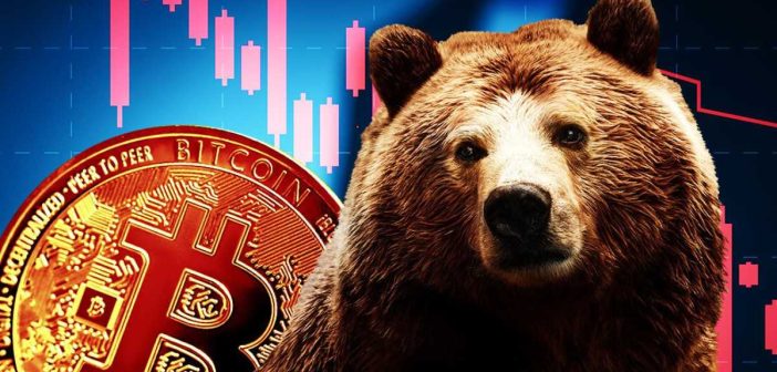 Bitcoin coin over red chart showing market dip in June