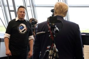 Elon Musk speaking at a press conference
