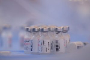 Medical professional administering HYMPAVZI injection to a patient
