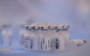 Medical professional administering HYMPAVZI injection to a patient